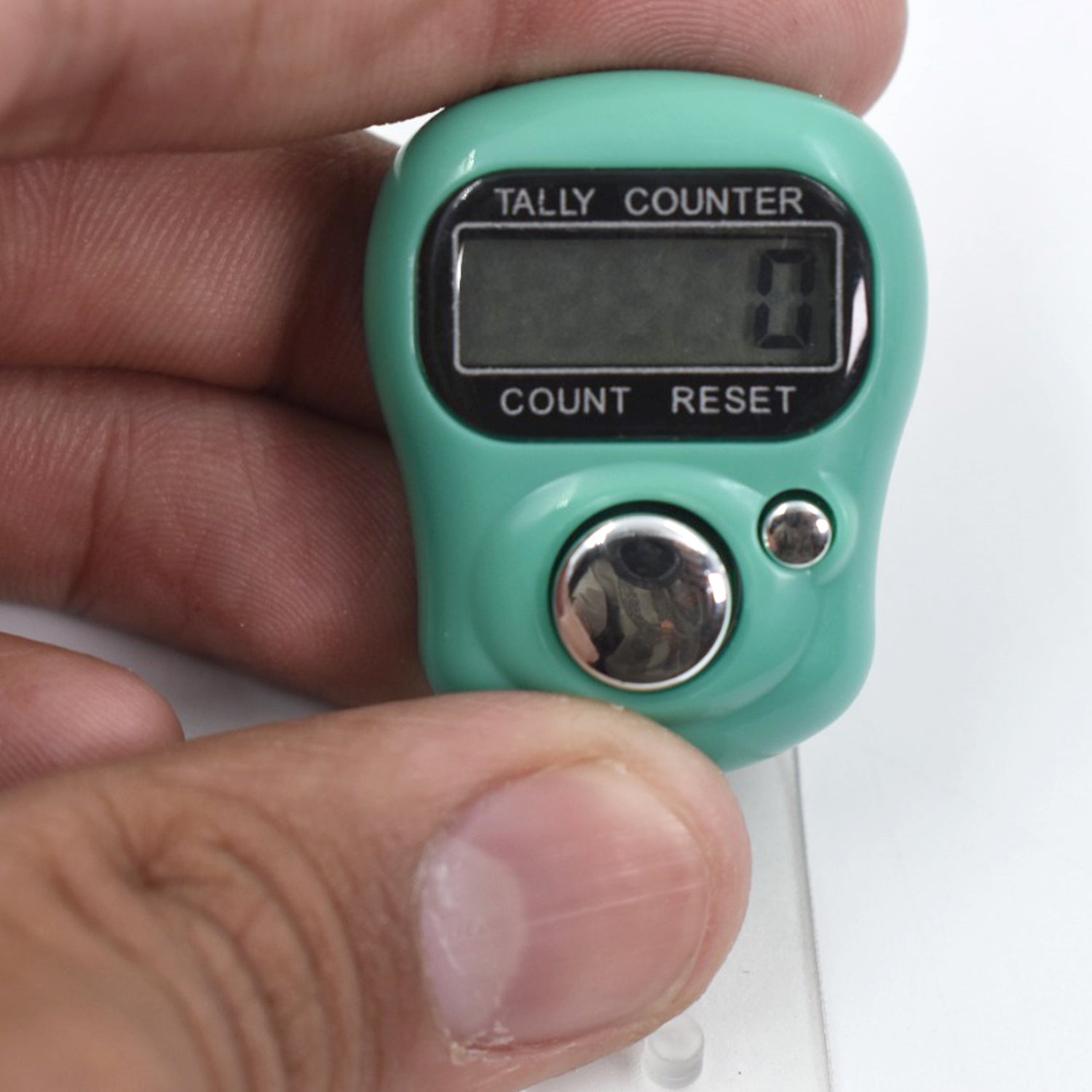 Ergonomic tally counter with a sleek design for comfortable use. Ergonomic tally counter with a sleek design for comfortable use.